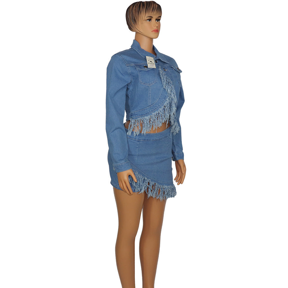 Mannequin wearing a blue denim jacket and skirt set on a white background
