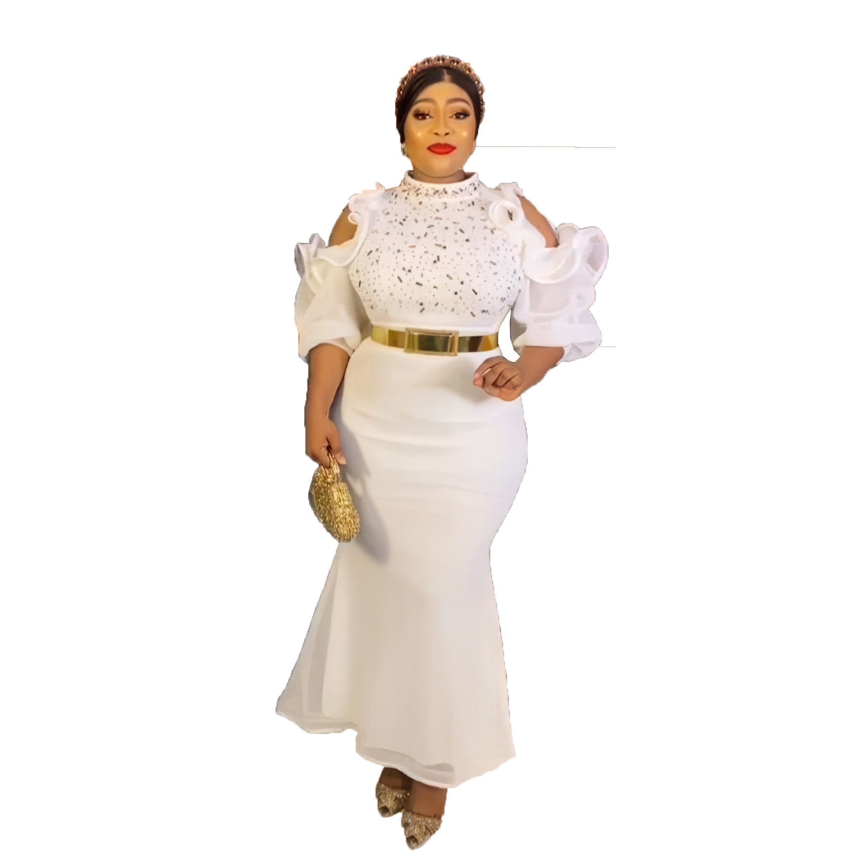 Woman wearing a white outfit with gold accents on a white background