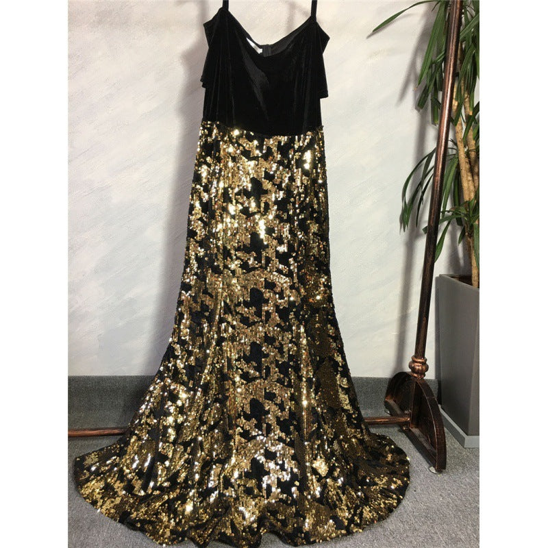 Black and gold sequin dress on a white background