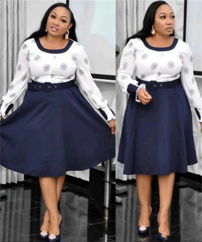 Woman wearing a white blouse with blue patterns and a navy blue skirt in two different poses.