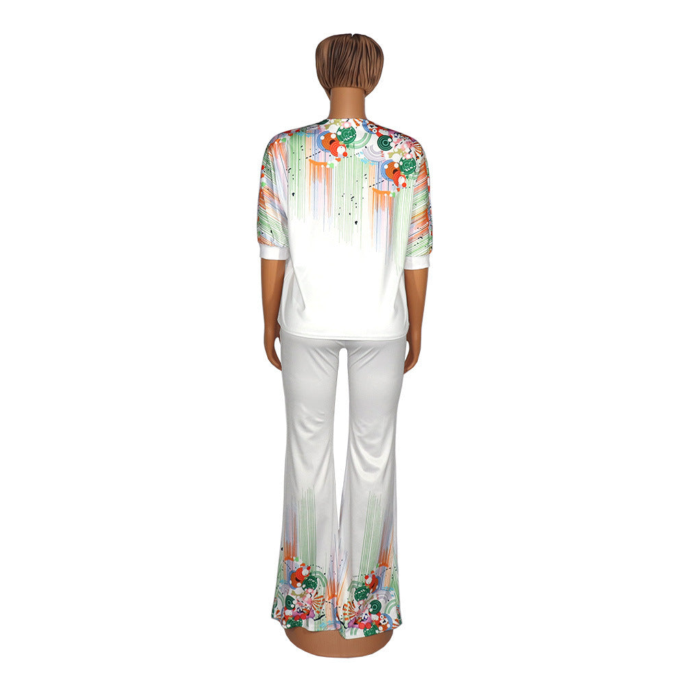 Mannequin wearing a floral top and white pants on a white background
