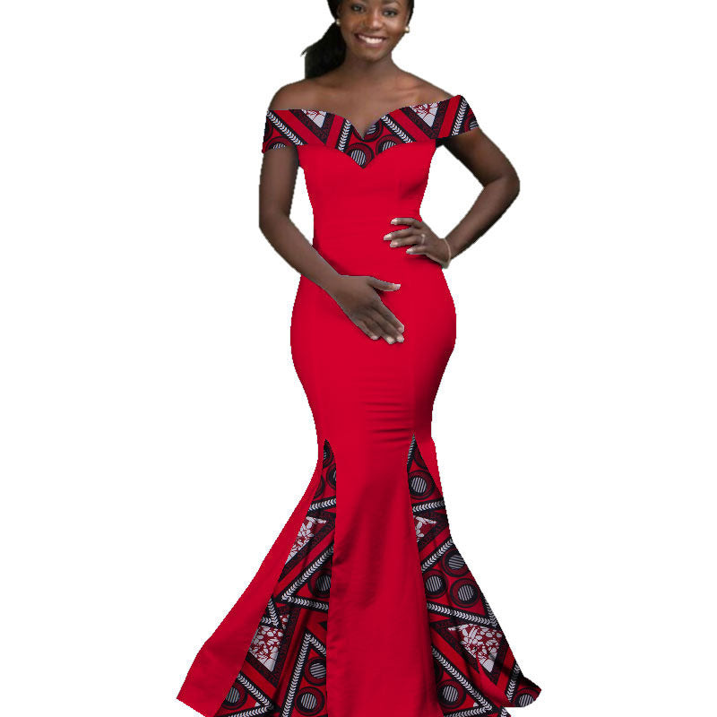 Red evening gown with black and white pattern on a white background
