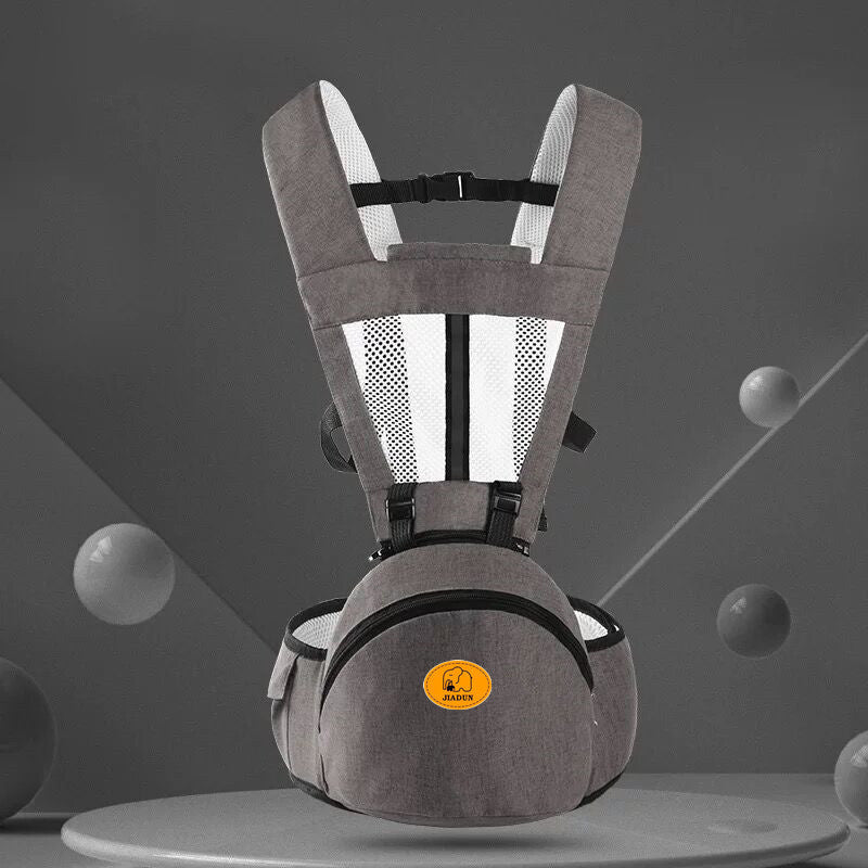 Gray baby carrier with a visible brand logo on a gray background