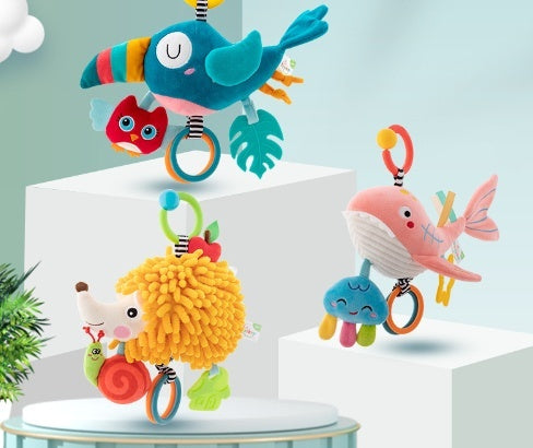 Colorful baby toys on a white stand with a light blue background