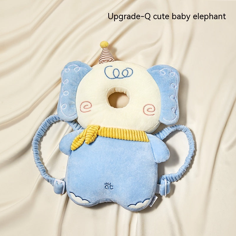 Cute baby elephant plush toy with a donut on a beige background