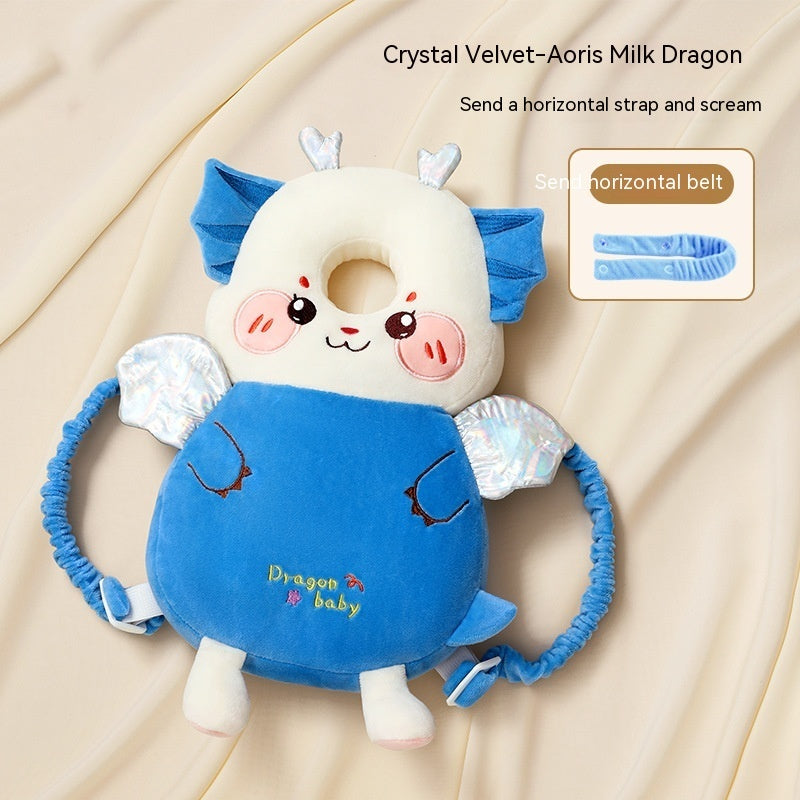 Plush toy with dragon design on a beige background