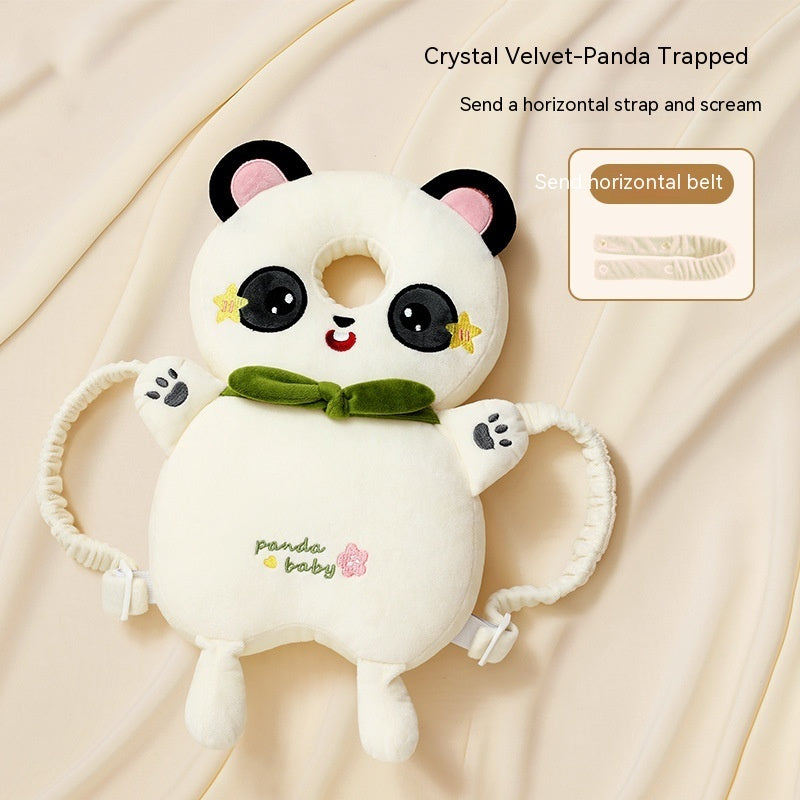 Plush panda toy with a green bow tie on a beige background