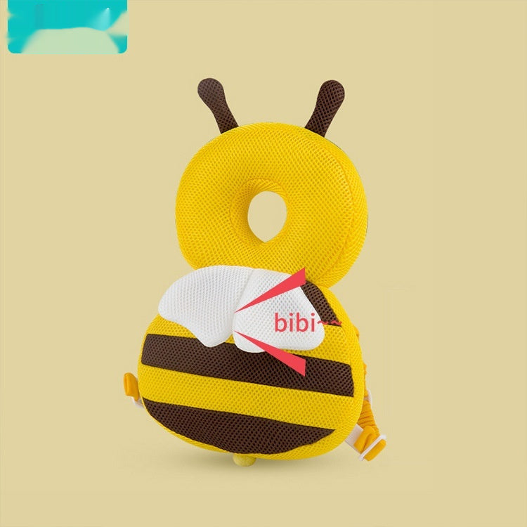 Yellow bee-shaped bib with 'bibi' branding on a beige background