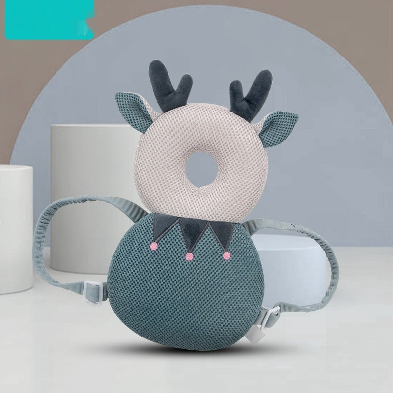 Deer-shaped pillow with a strap on a neutral background