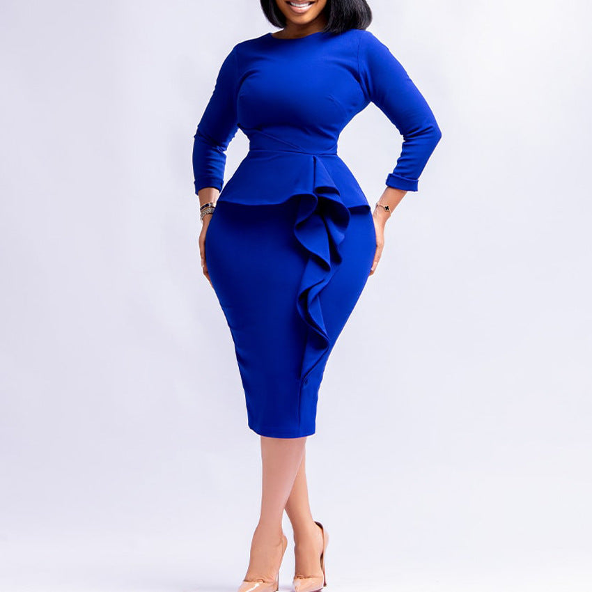 Blue dress with peplum detail on a white background