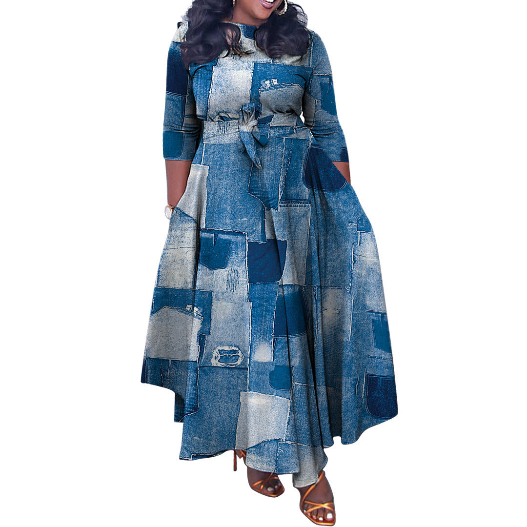 Woman wearing a patchwork denim dress on a white background