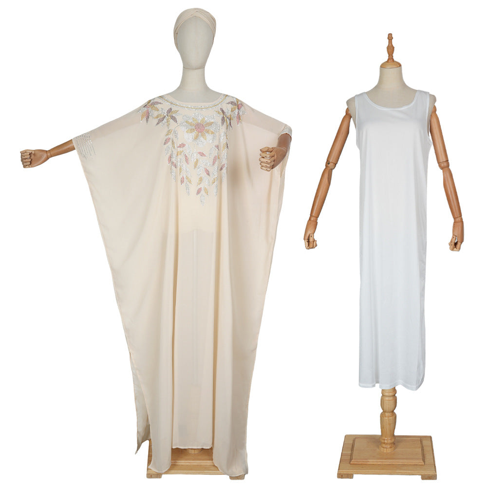Two mannequins wearing dresses on a white background