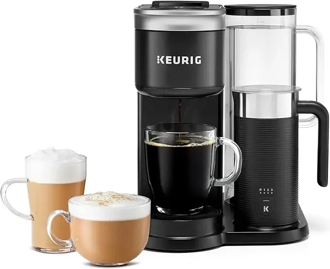 Keurig coffee maker with a glass carafe and three cups of coffee on a white background