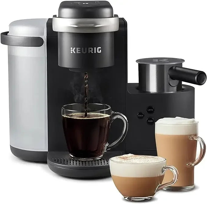 Keurig coffee maker with a cup of coffee and three other beverages on a white background