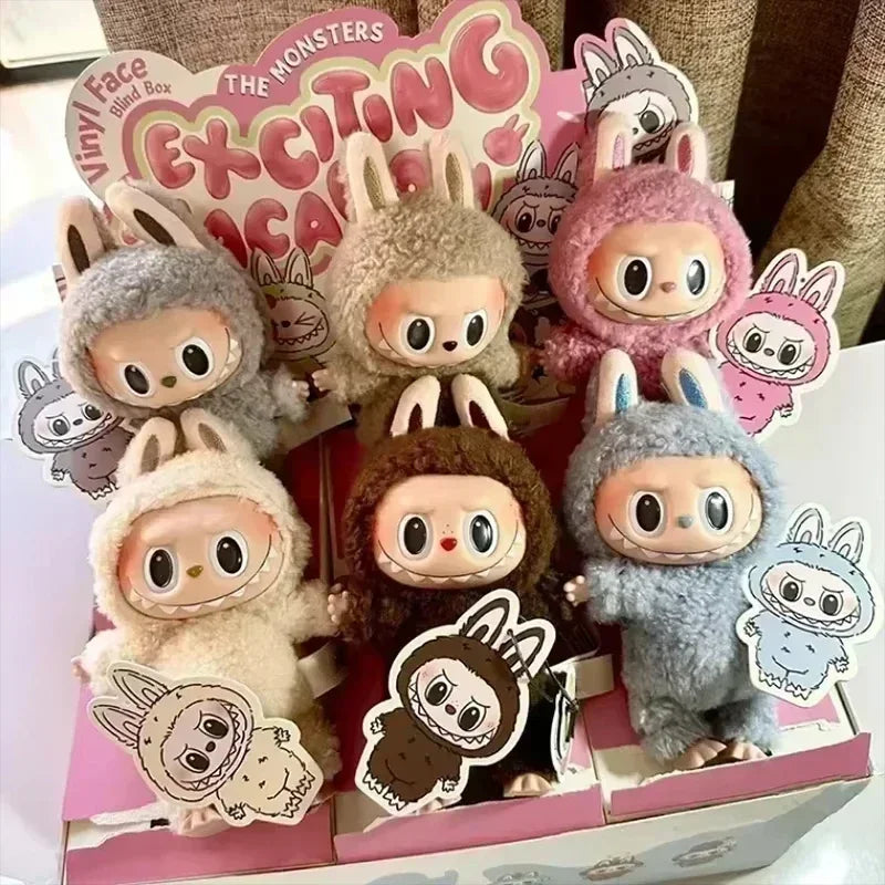 Collection of cute plush toys with bunny ears in a box, featuring promotional text.