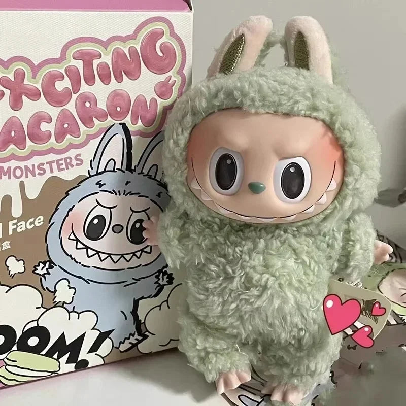 Plush toy with a cartoonish design in front of a box with illustrations and text.