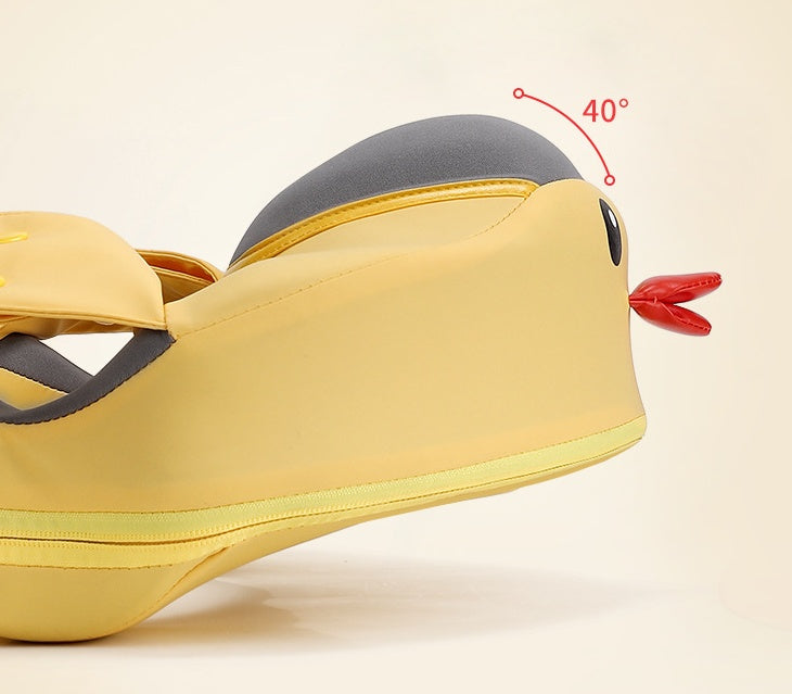 Yellow car seat with a gray cushion and red safety strap on a beige background