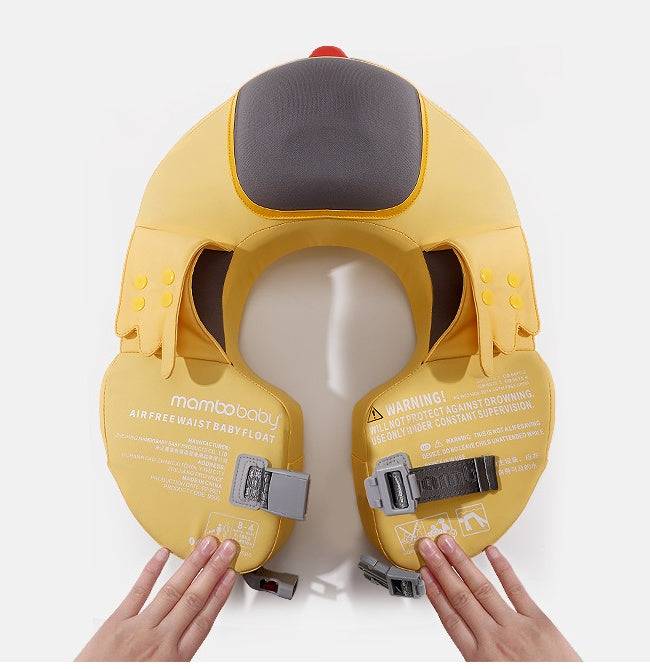 Yellow airbag baby seat on a mannequin head with hands holding it, on a white background