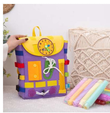 Colorful children's backpack with various compartments on a white background