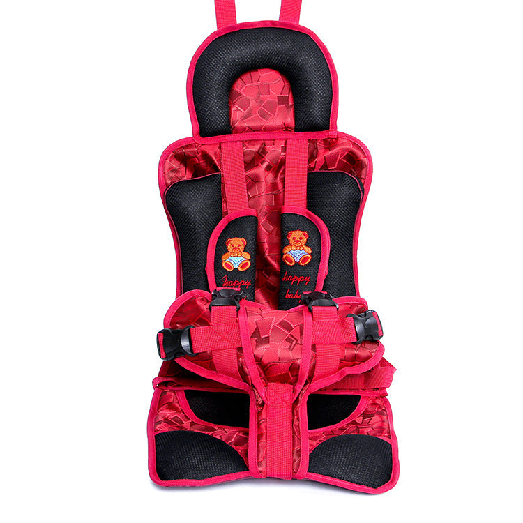 Red and black child safety seat with teddy bear design on a white background