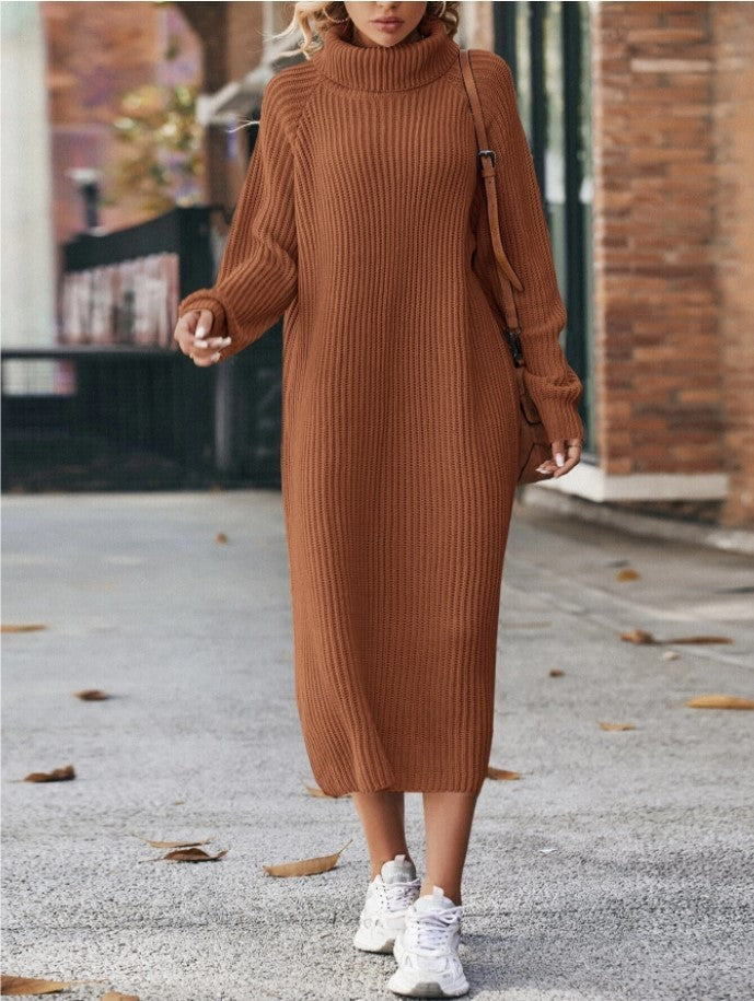 Person wearing a brown ribbed dress with white sneakers on a street.