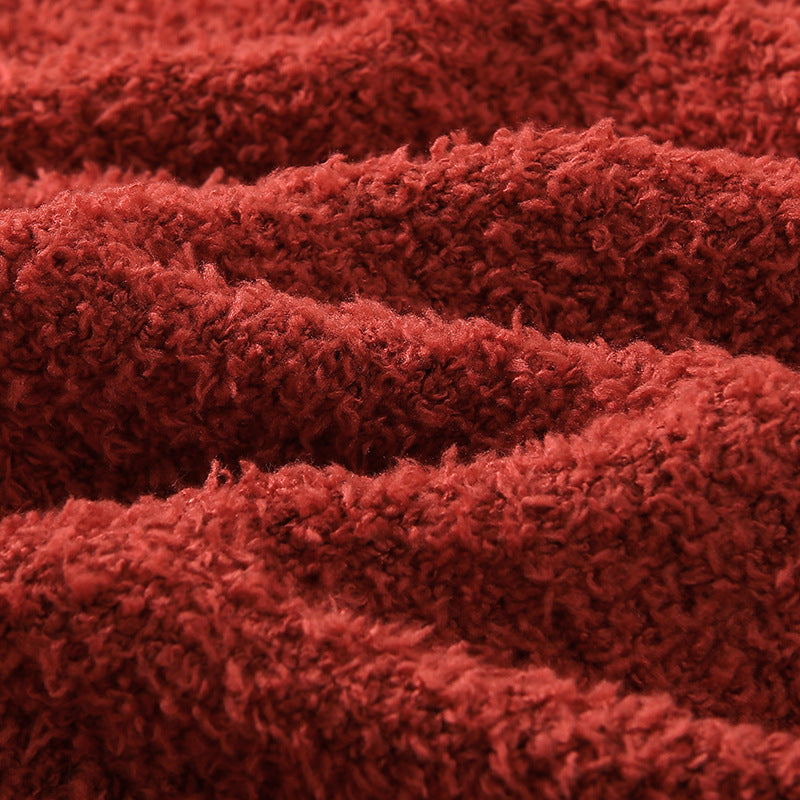 Close-up of a textured red fabric surface