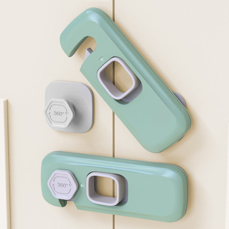 Two green door handles with a gray handle on a tiled wall background