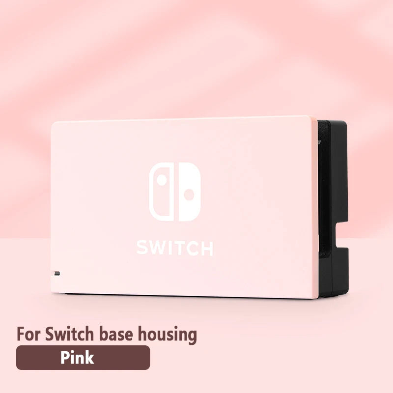 Pink Nintendo Switch base housing on a pink background