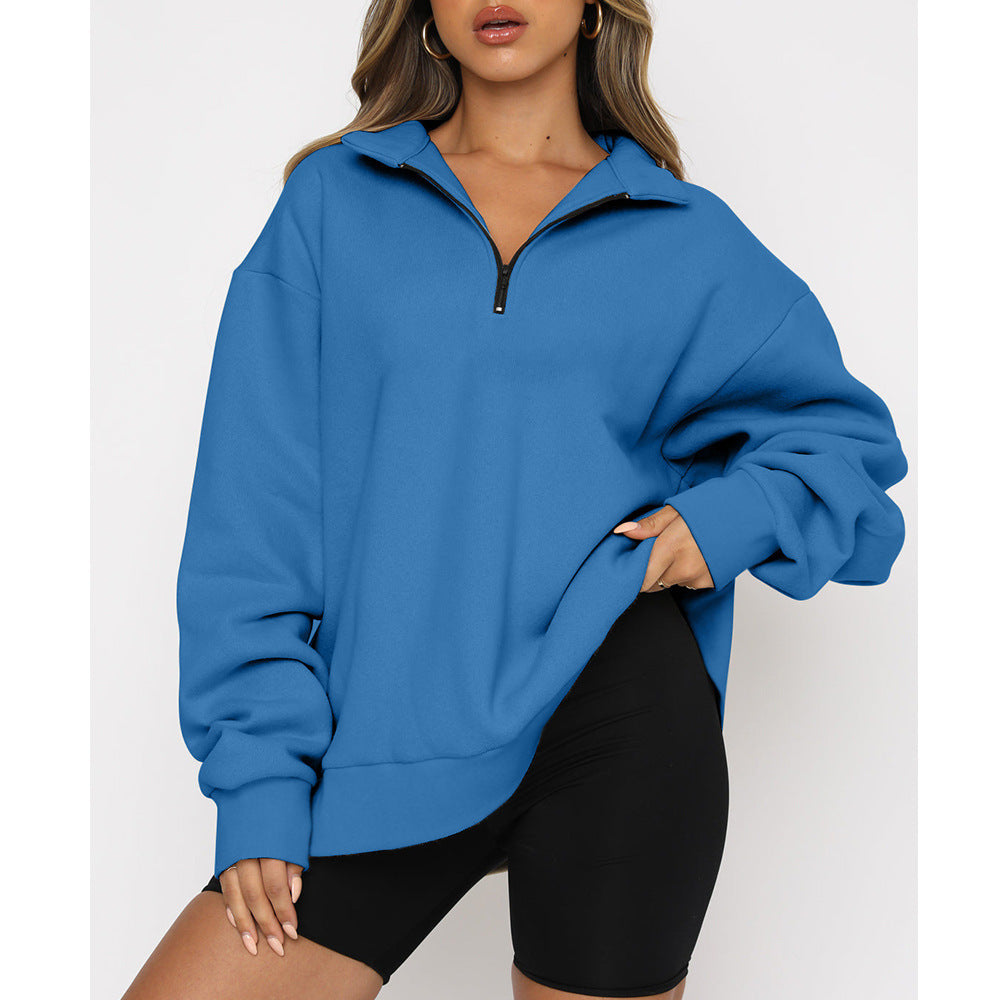 Blue pullover worn by a person on a white background