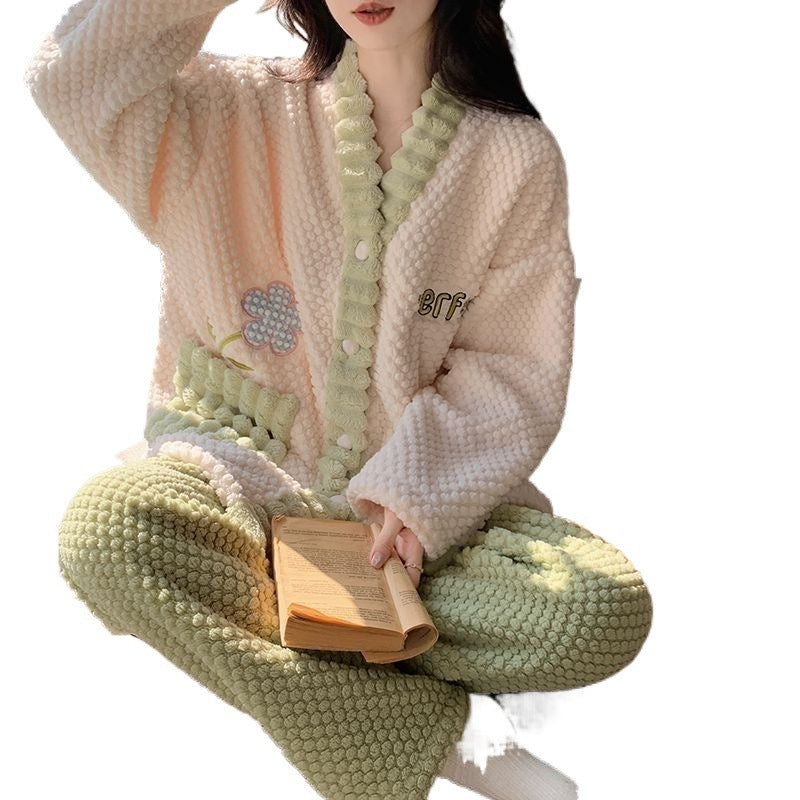 Person wearing a cozy, textured outfit with a book on a white background